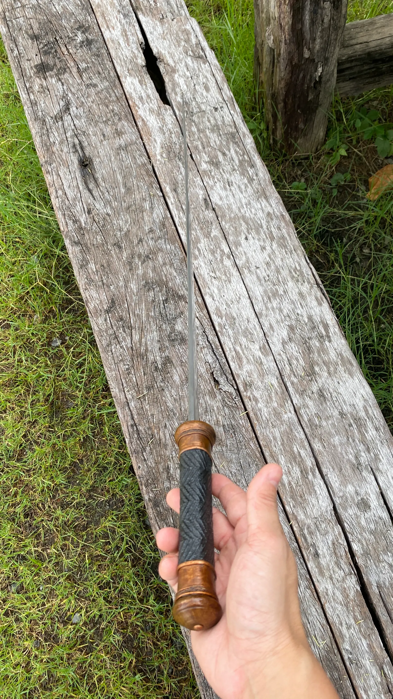 The short handle held upright, for a sense of its scale.